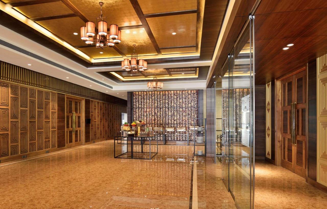 Radisson Blu Plaza Resort & Convention Centre Karjat Exteriör bild The lobby of the hotel