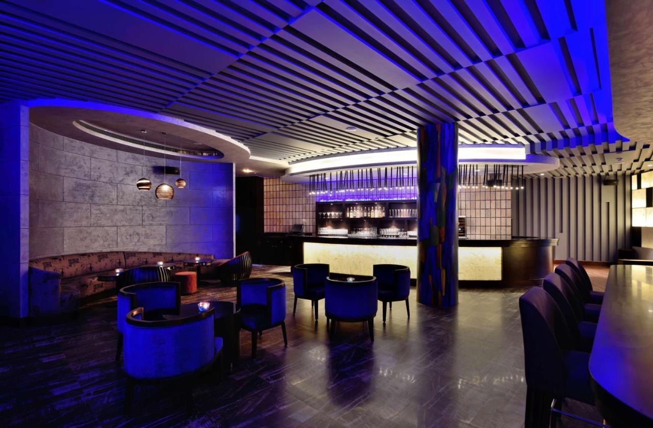 Radisson Blu Plaza Resort & Convention Centre Karjat Exteriör bild The bar at the 101 bar